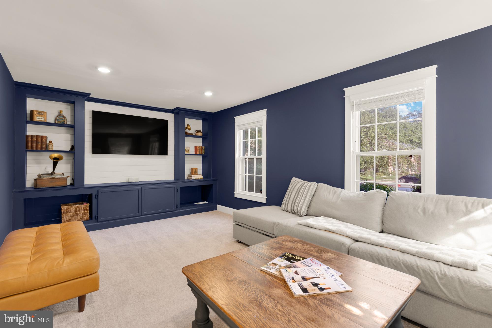 2429 Alsop Court Reston, VA 20191 - Photo 24 of 44 a living room with furniture and a flat screen tv