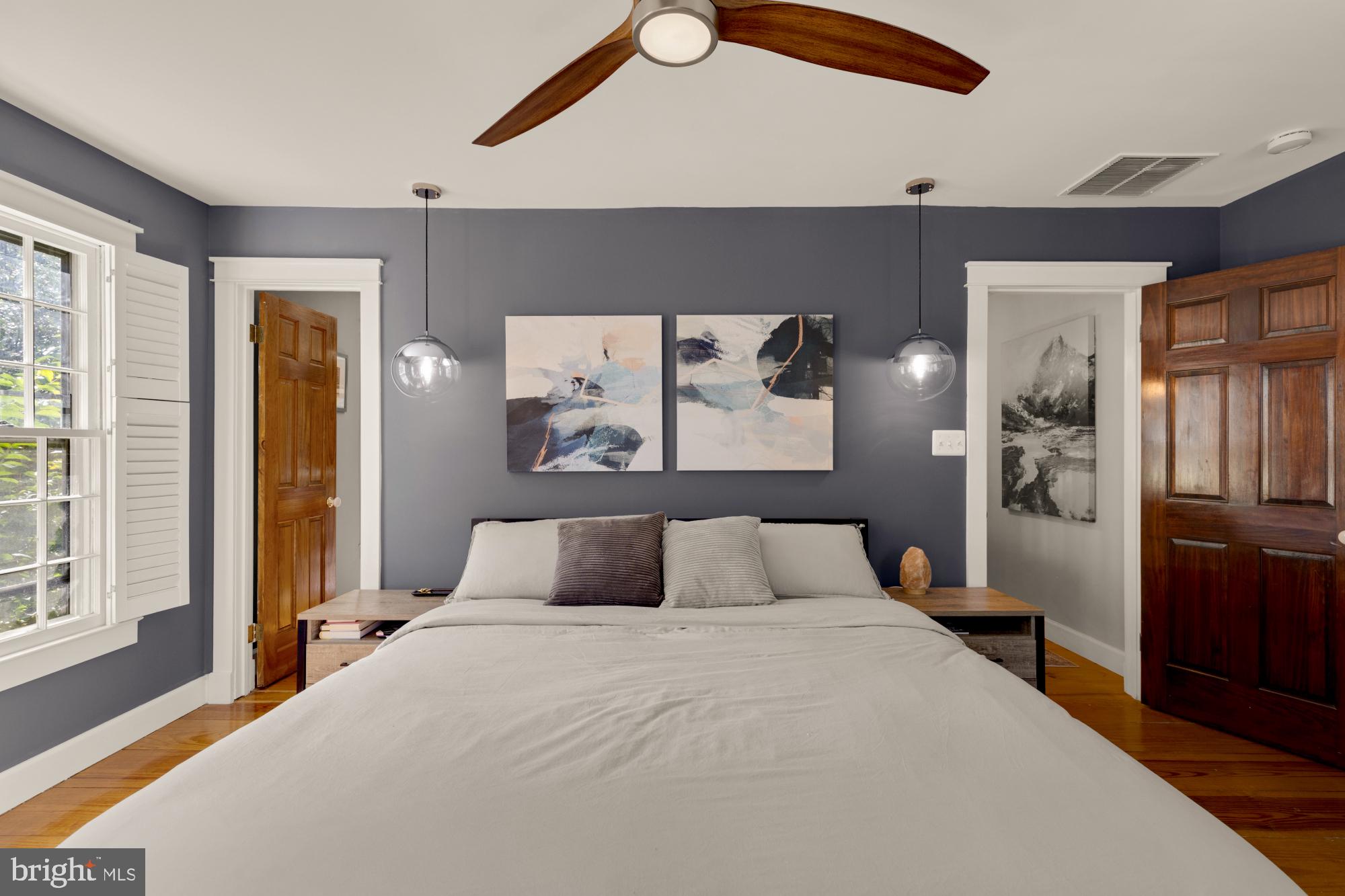 2429 Alsop Court Reston, VA 20191 - Photo 27 of 44 a bedroom with a large bed and a window