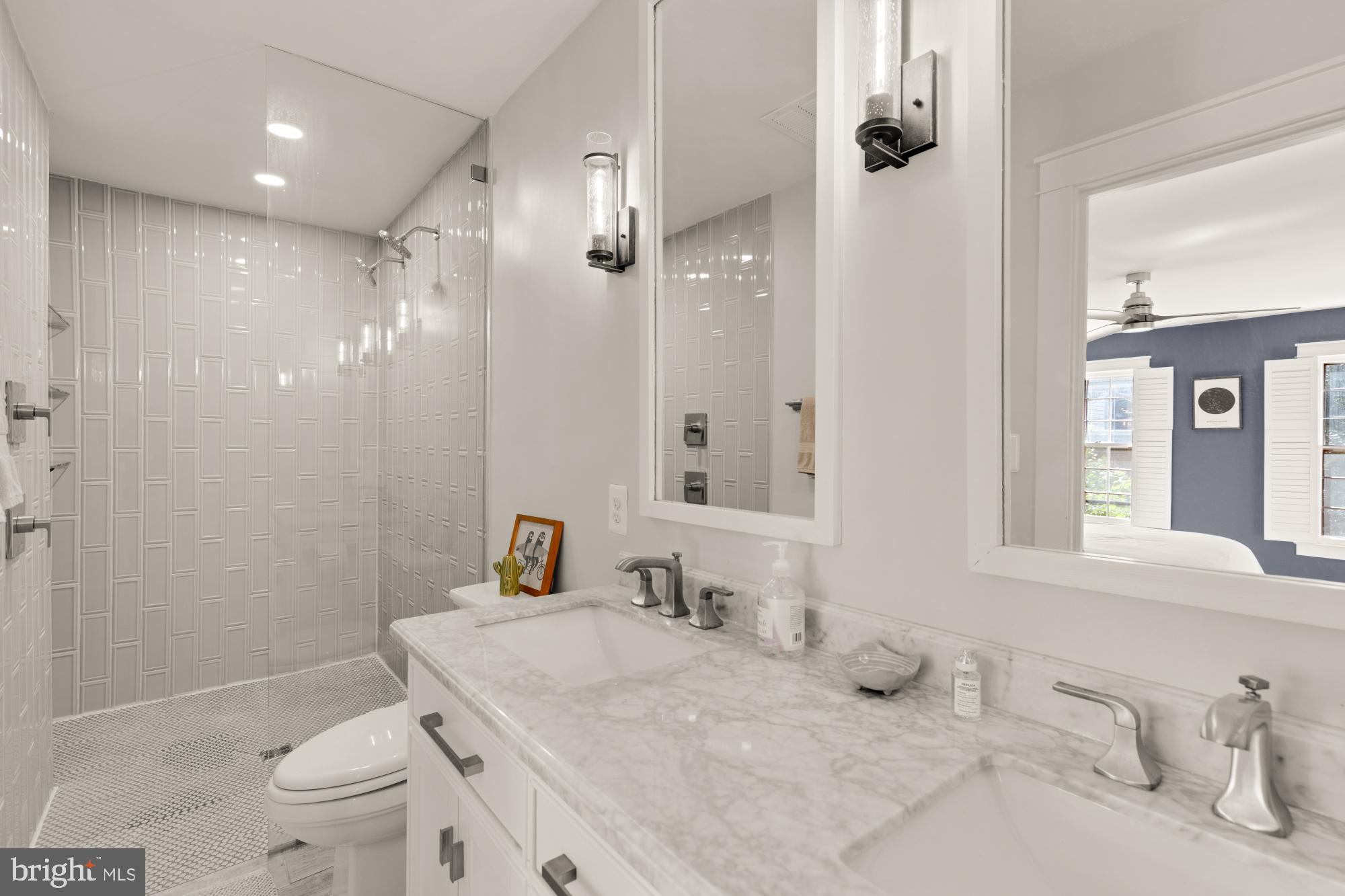 2429 Alsop Court Reston, VA 20191 - Photo 29 of 44 a bathroom with a sink toilet tub and shower