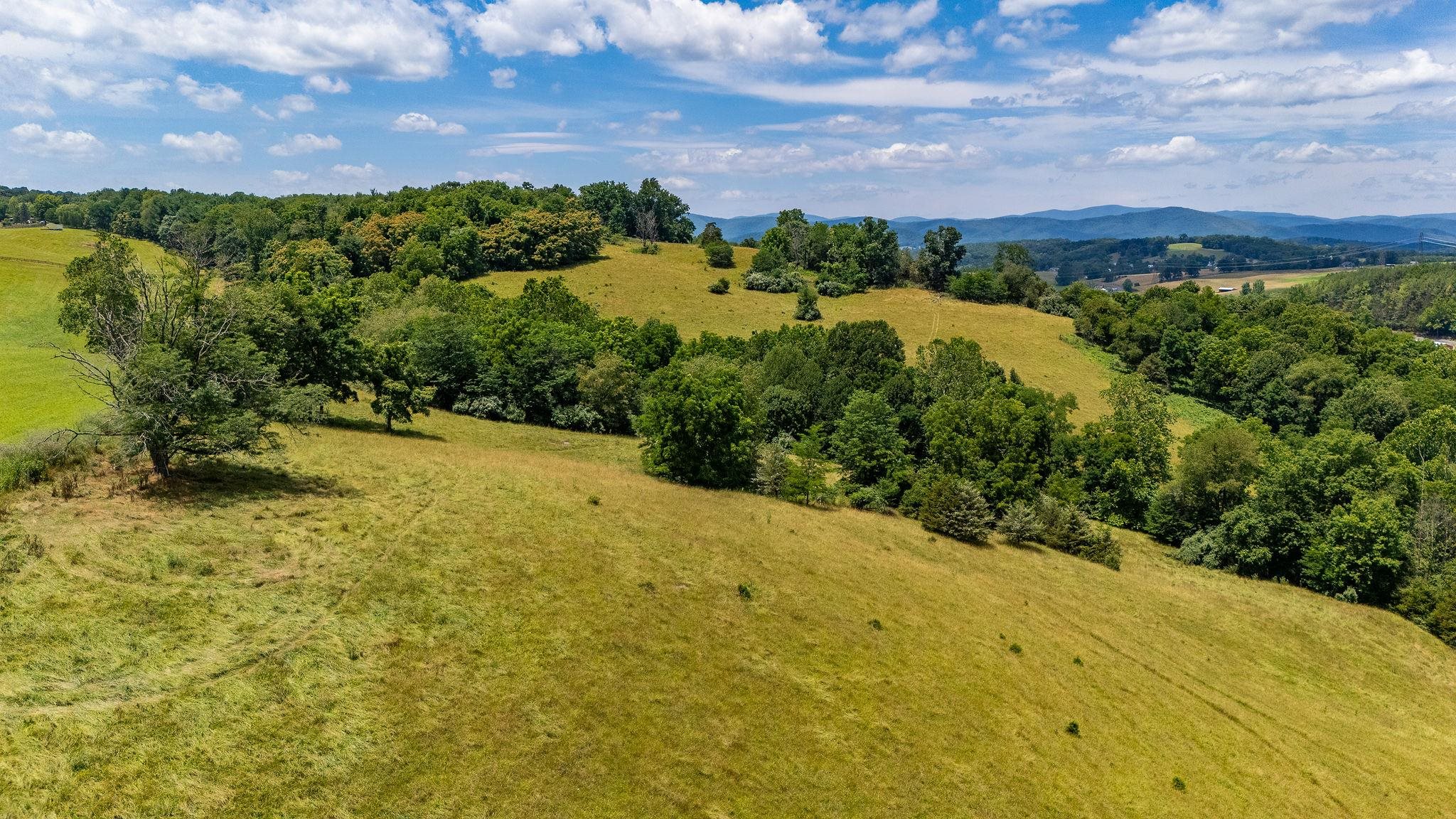 1748 Moffett Branch Road Churchville, VA 24421 - Photo 14 of 53 a view of a lake with a city