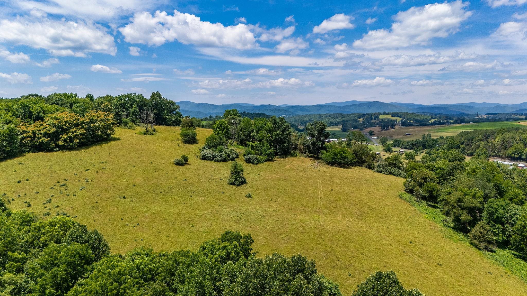 1748 Moffett Branch Road Churchville, VA 24421 - Photo 15 of 53 a view of a lake with a mountain in the background