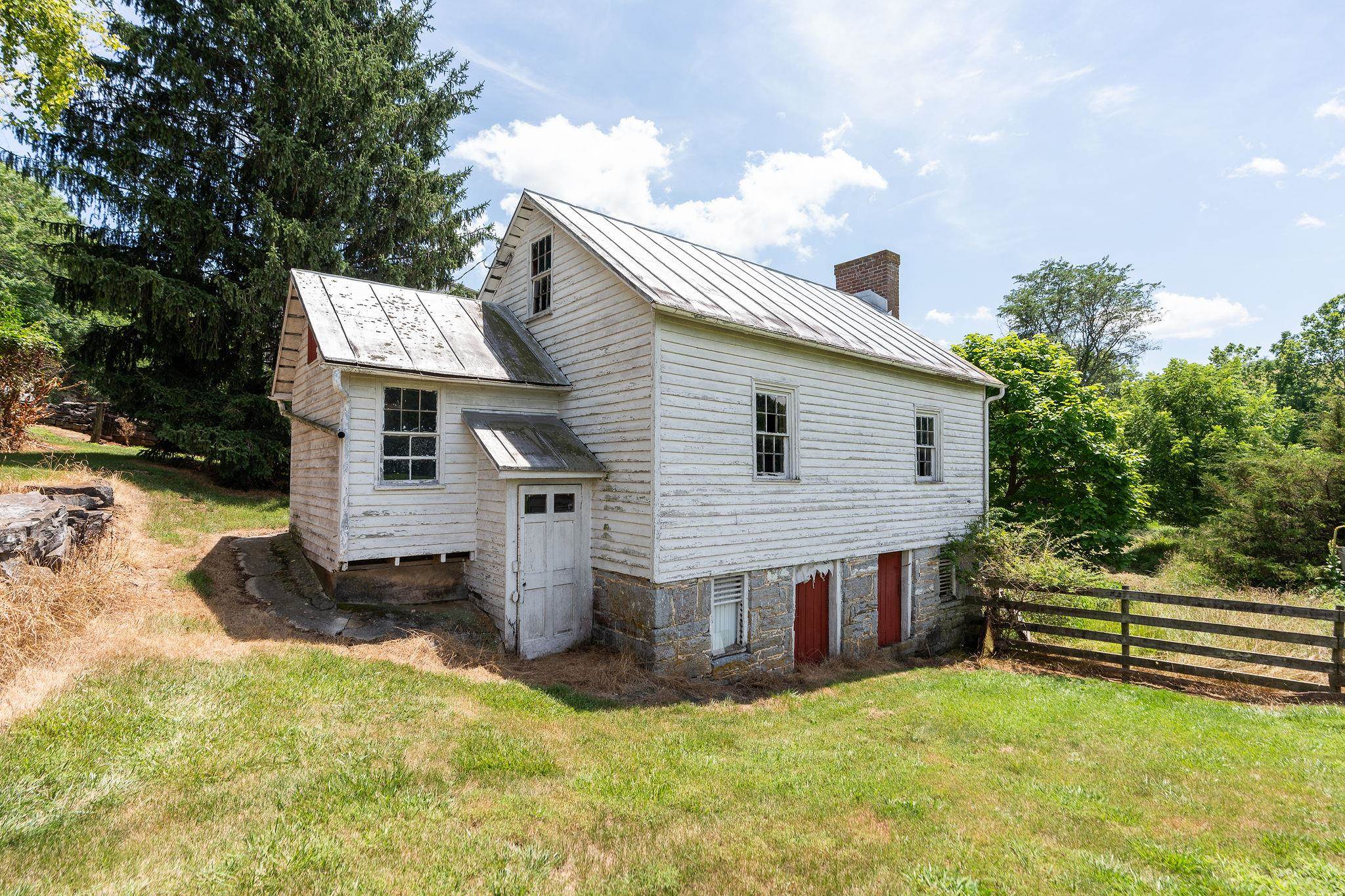 1748 Moffett Branch Road Churchville, VA 24421 - Photo 28 of 53 a view of a house with a yard potted plants and a tree