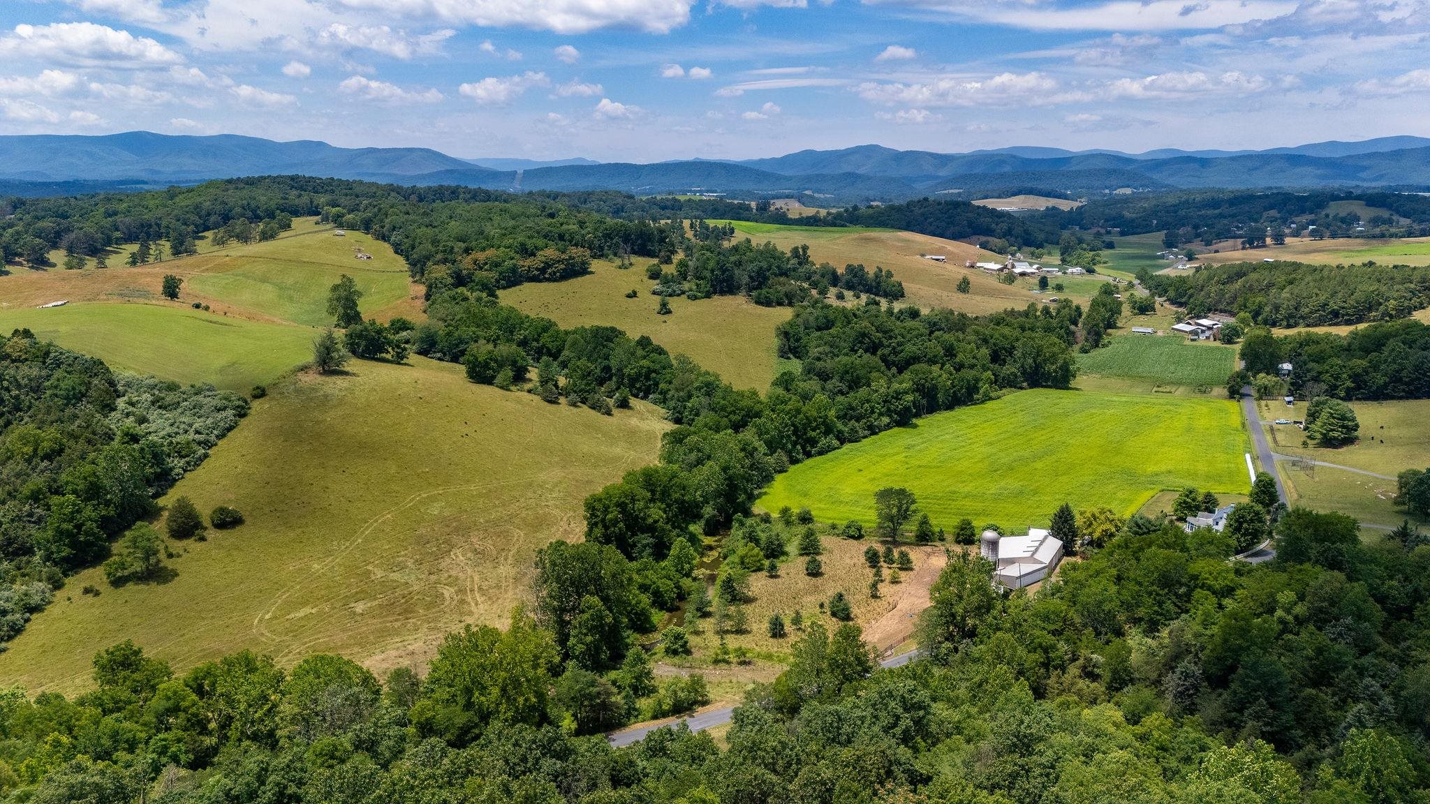1748 Moffett Branch Road Churchville, VA 24421 - Photo 6 of 53 an aerial view of lake with residential house