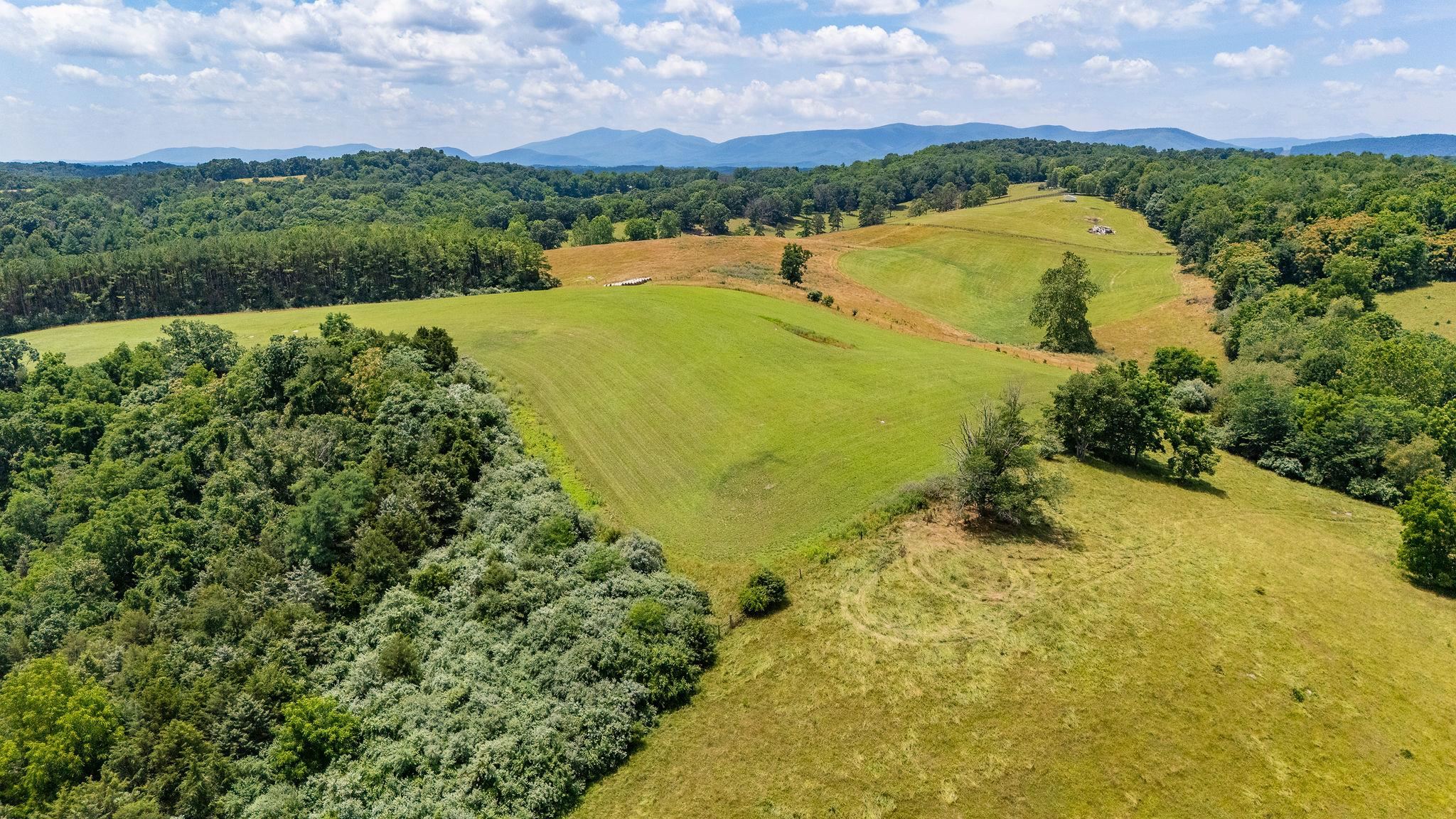 1748 Moffett Branch Road Churchville, VA 24421 - Photo 9 of 53 a view of a lake with a houses