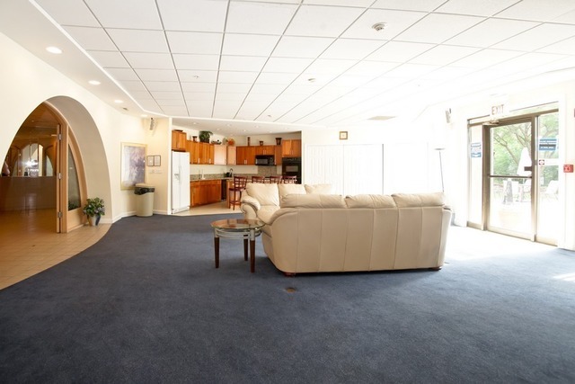 1 Renaissance Place, Unit 1106 Palatine, IL 60067 - Photo 11 of 15 a living room with furniture and a large window