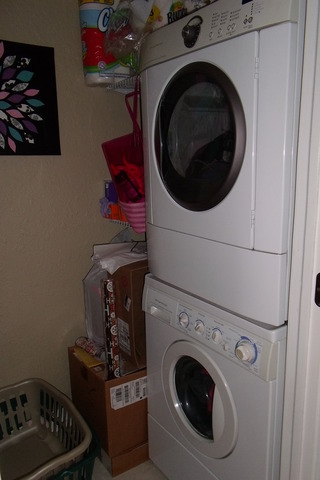 1 Renaissance Place, Unit 1106 Palatine, IL 60067 - Photo 8 of 15 a utility room with dryer and washer