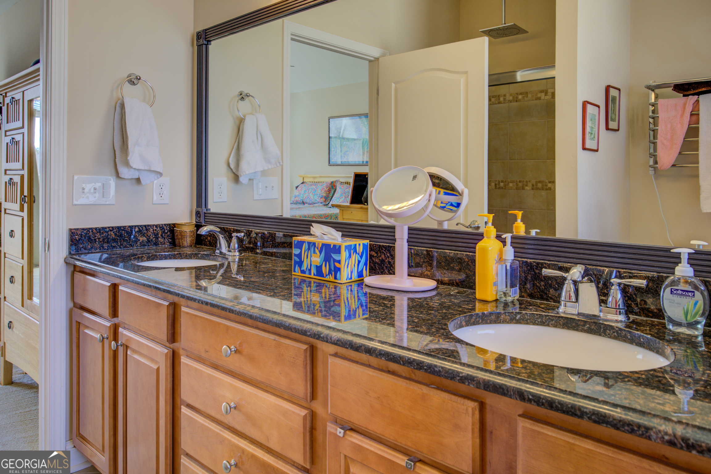 921 Yancey Road Covington, GA 30014 - Photo 35 of 85 a bathroom with double vanity sinks and a mirror