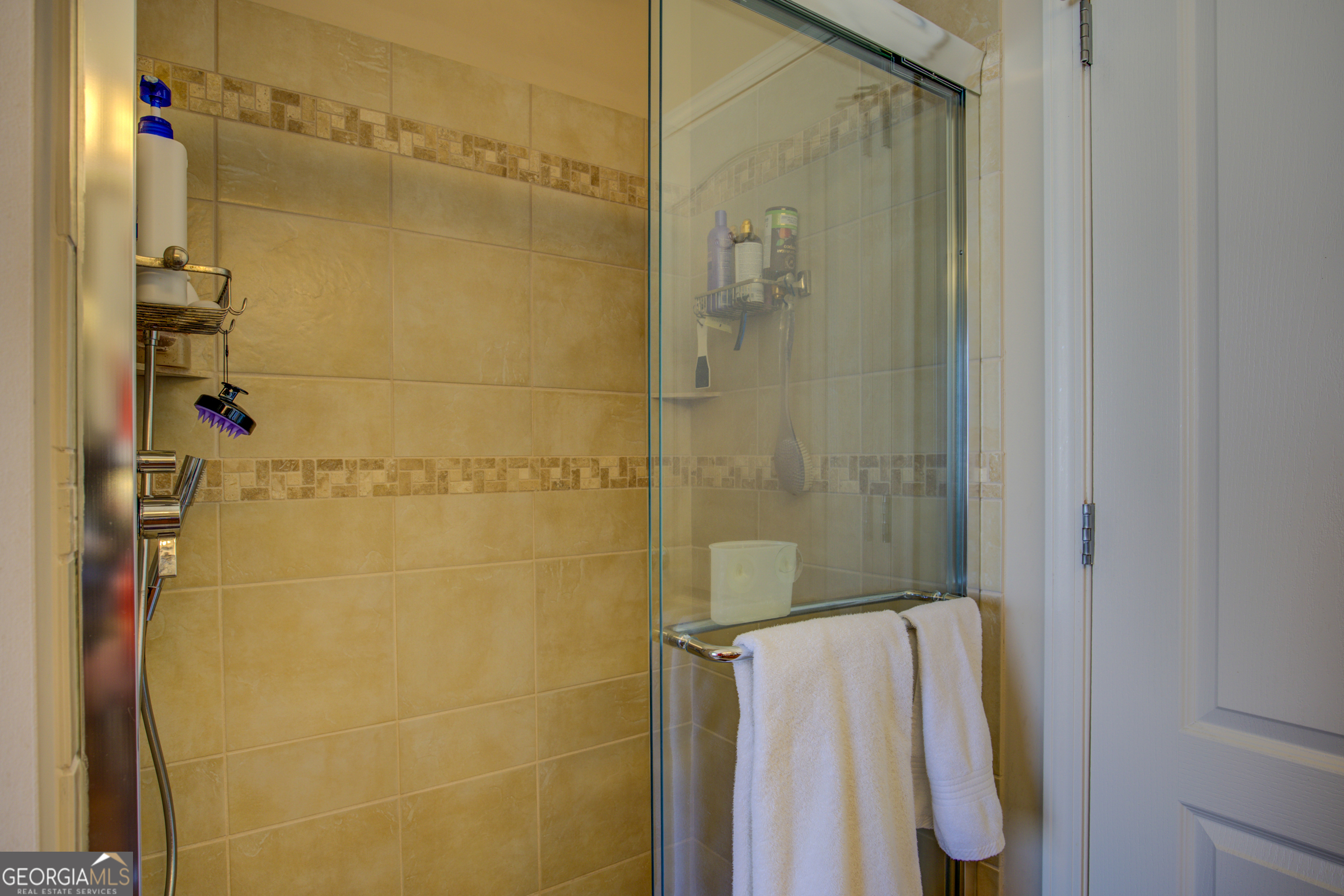 921 Yancey Road Covington, GA 30014 - Photo 36 of 85 a bathroom with a shower and a shower