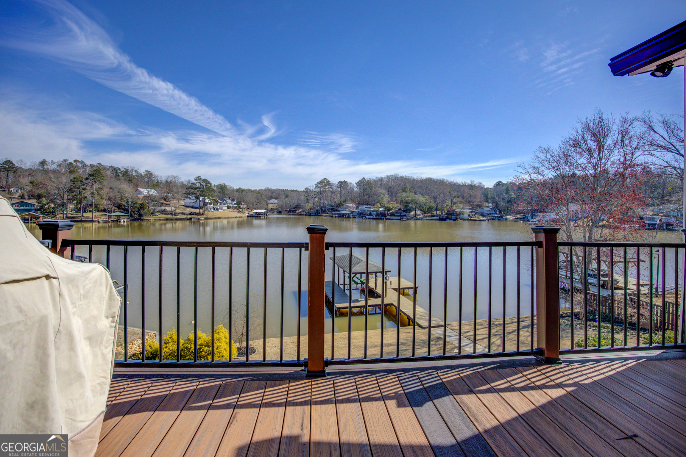 921 Yancey Road Covington, GA 30014 - Photo 46 of 85 a view of balcony with wooden floor and fence