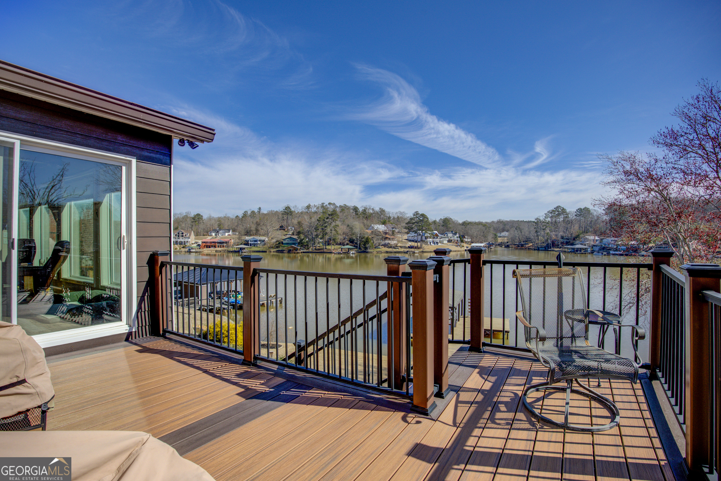 921 Yancey Road Covington, GA 30014 - Photo 47 of 85 a view of balcony with wooden floor and outdoor seating