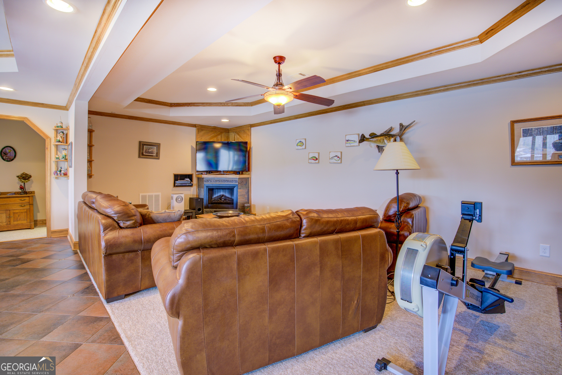 921 Yancey Road Covington, GA 30014 - Photo 53 of 85 a living room with furniture and a wooden floor