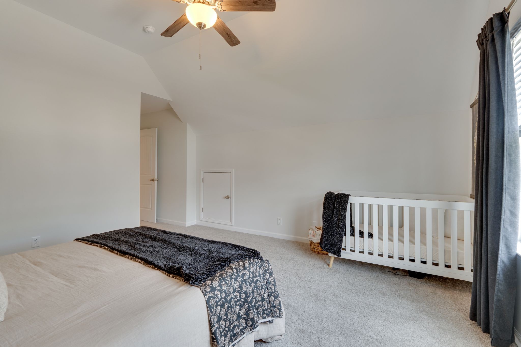 3229 Chatfield Drive Murfreesboro, TN 37129 - Photo 22 of 26 a bedroom with a bed and a chandelier