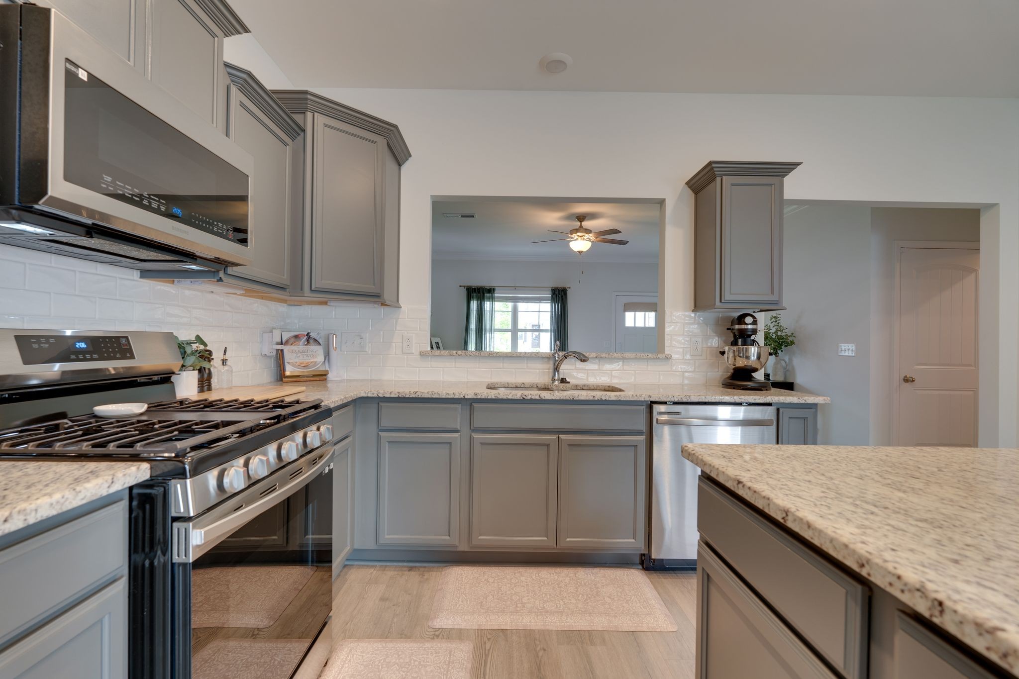 3229 Chatfield Drive Murfreesboro, TN 37129 - Photo 10 of 26 a kitchen with stainless steel appliances granite countertop a sink stove and cabinets