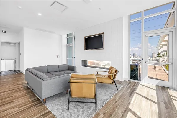a living room with a table and chair