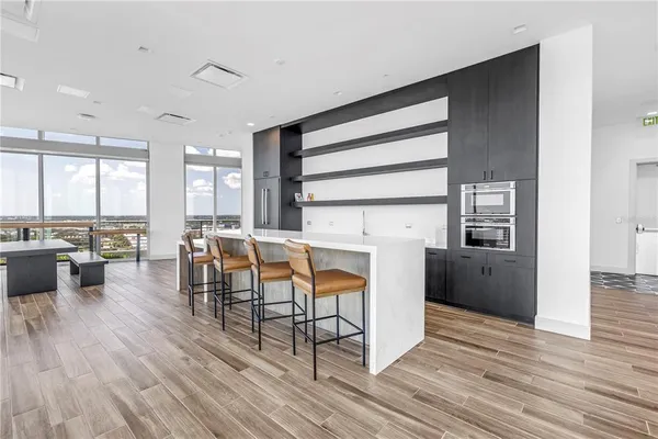 a view of a room with a large window