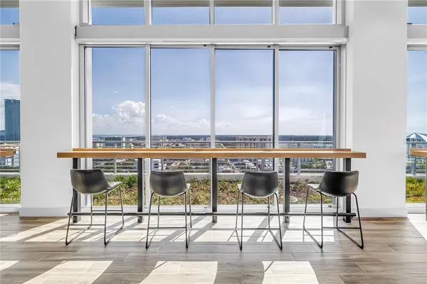 a view of porch with a floor to ceiling window and an entryway