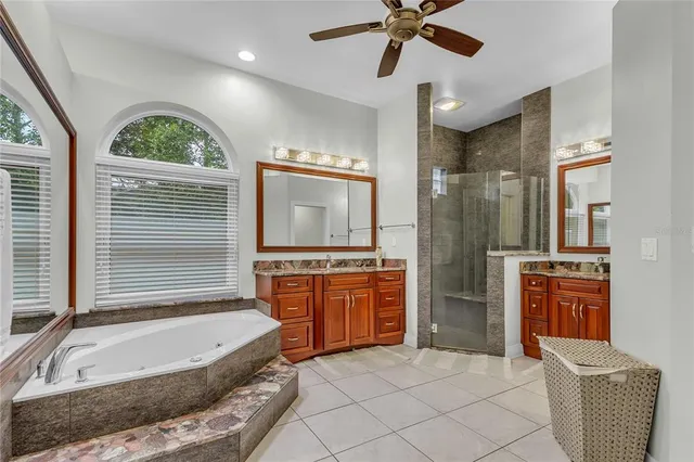 a white toilet sitting next to a small bathroom