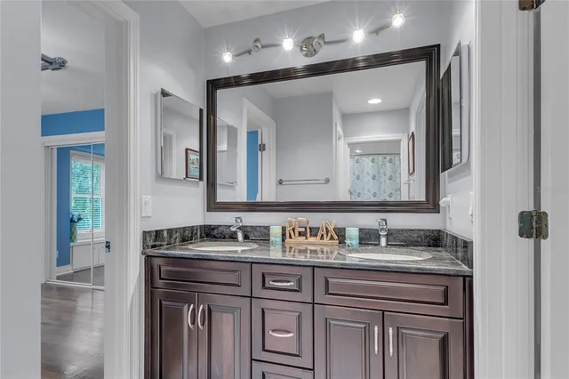 a front view of a house with a yard table and chairs