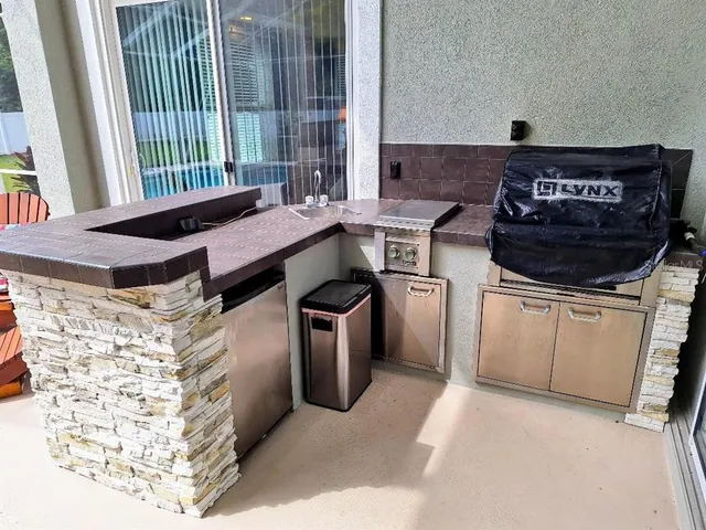 a kitchen with a stove and a microwave