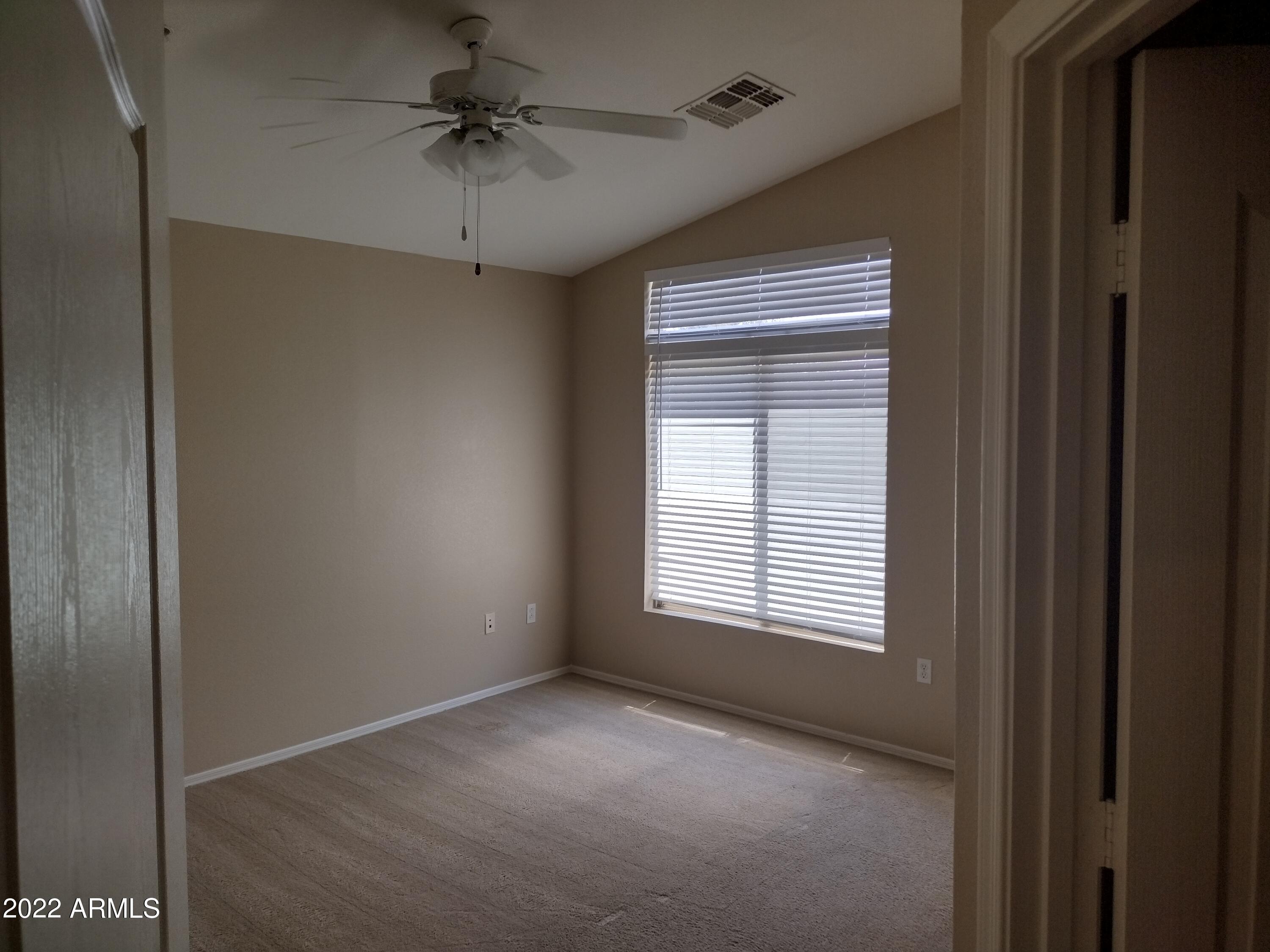 2401 East Rio Salado Parkway, Unit 1076 Tempe, AZ 85288 - Photo 11 of 15 a view of an empty room with a window