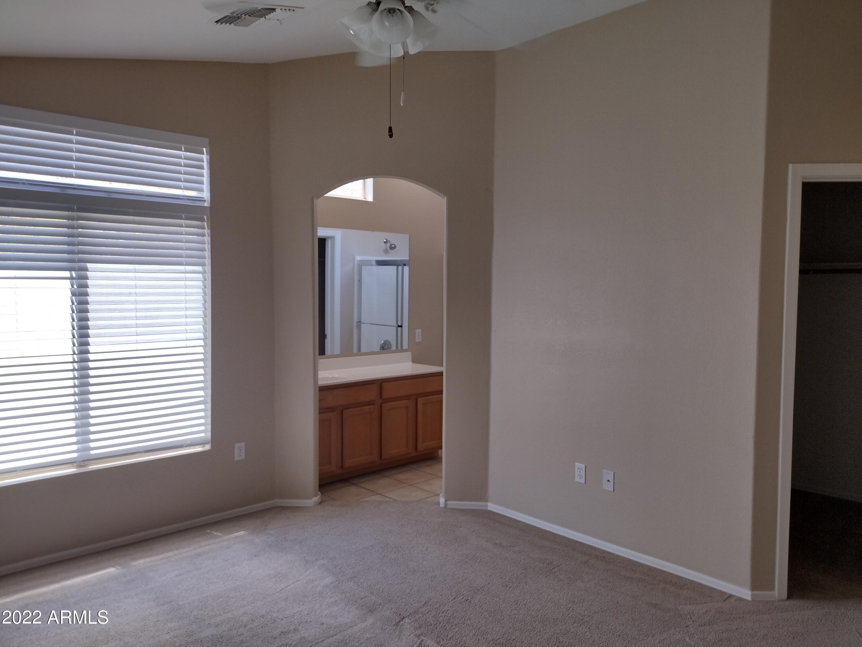 2401 East Rio Salado Parkway, Unit 1076 Tempe, AZ 85288 - Photo 12 of 15 a view of an empty room with window and cabinet
