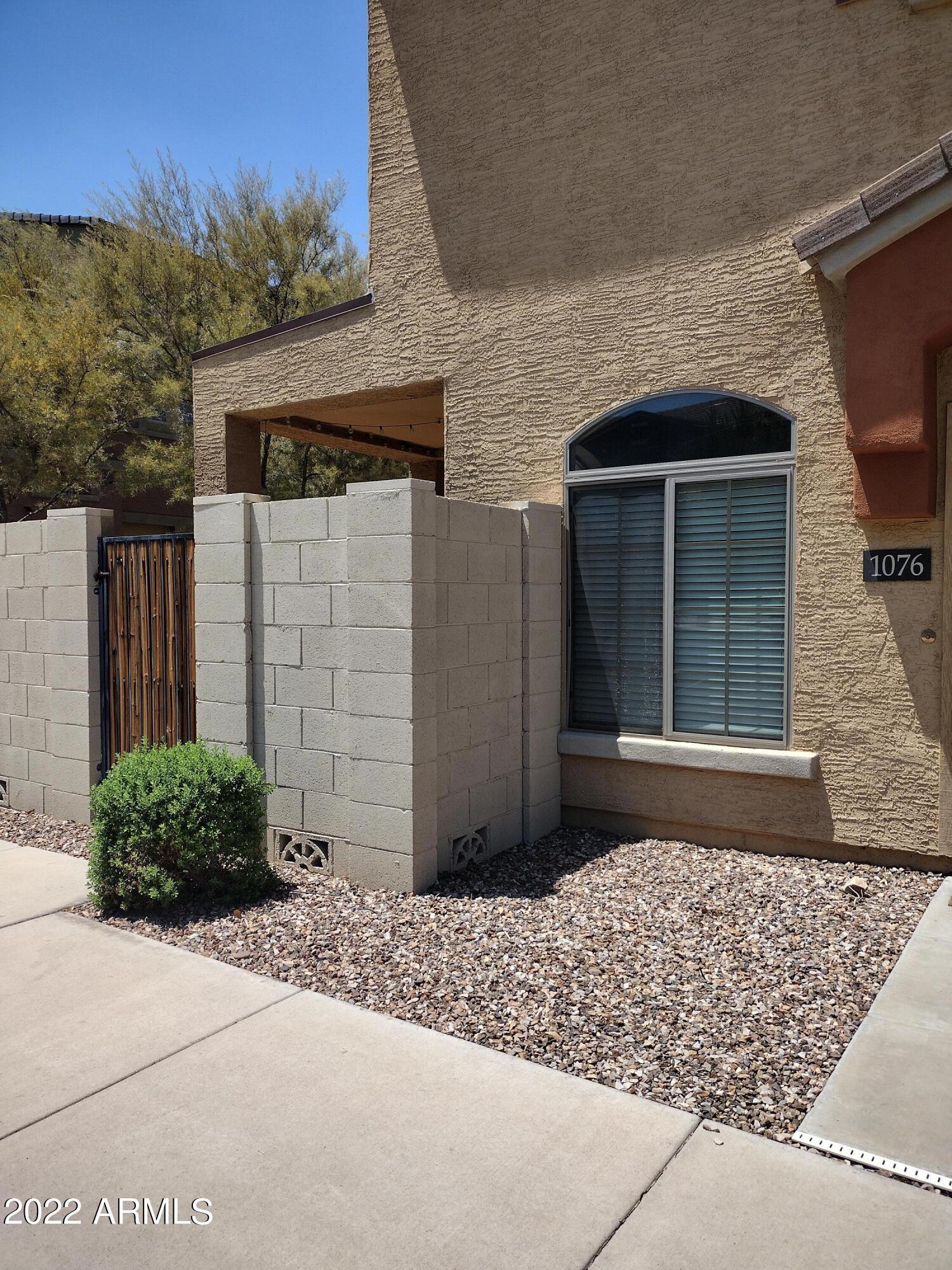 2401 East Rio Salado Parkway, Unit 1076 Tempe, AZ 85288 - Photo 2 of 15 a couple of potted plants in front of door