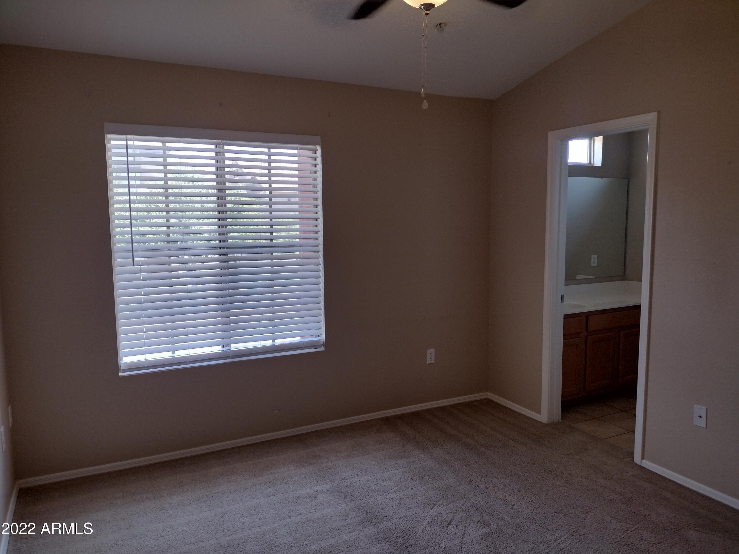 2401 East Rio Salado Parkway, Unit 1076 Tempe, AZ 85288 - Photo 8 of 15 an empty room with a window