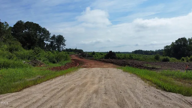 a view of a lake with a yard