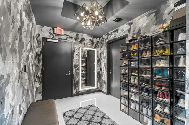 a view of a livingroom with a bookshelf