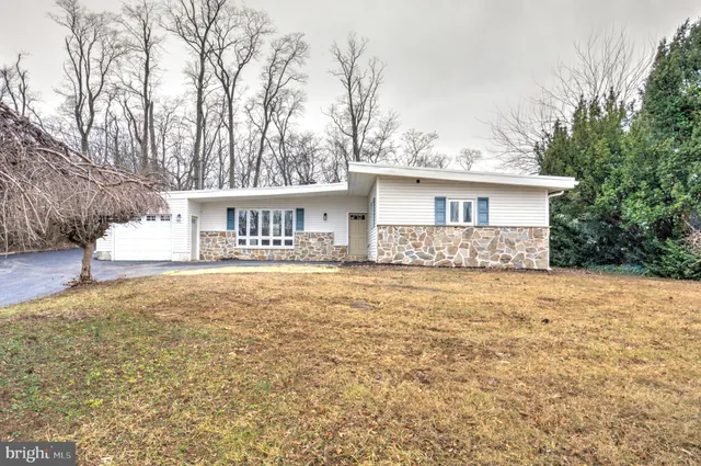 a house view with a garden space
