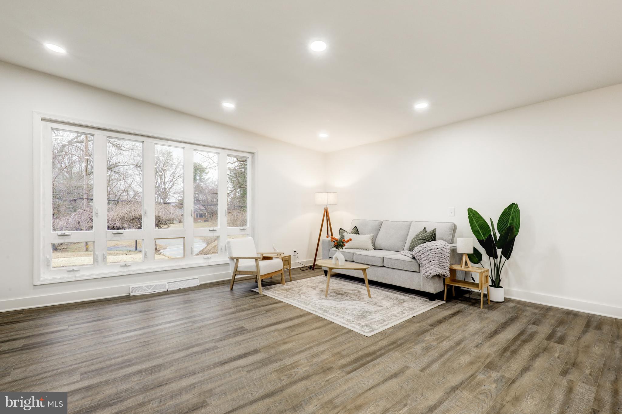 904 South Chester Road West Chester, PA 19382 - Photo 17 of 47 a living room with furniture and a large window