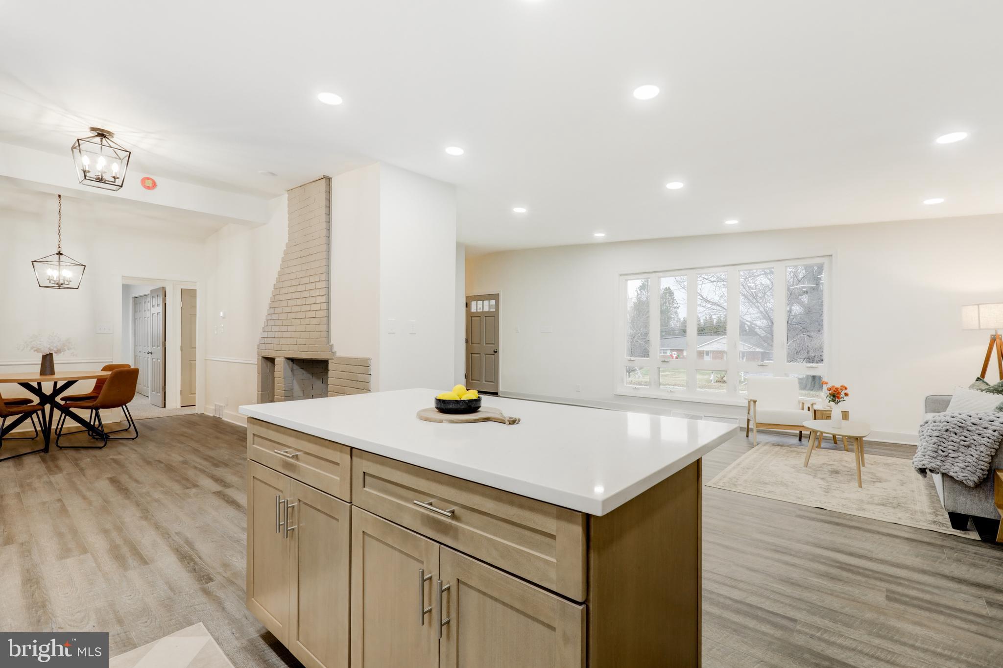 904 South Chester Road West Chester, PA 19382 - Photo 20 of 47 a view of kitchen island wooden floor and living room