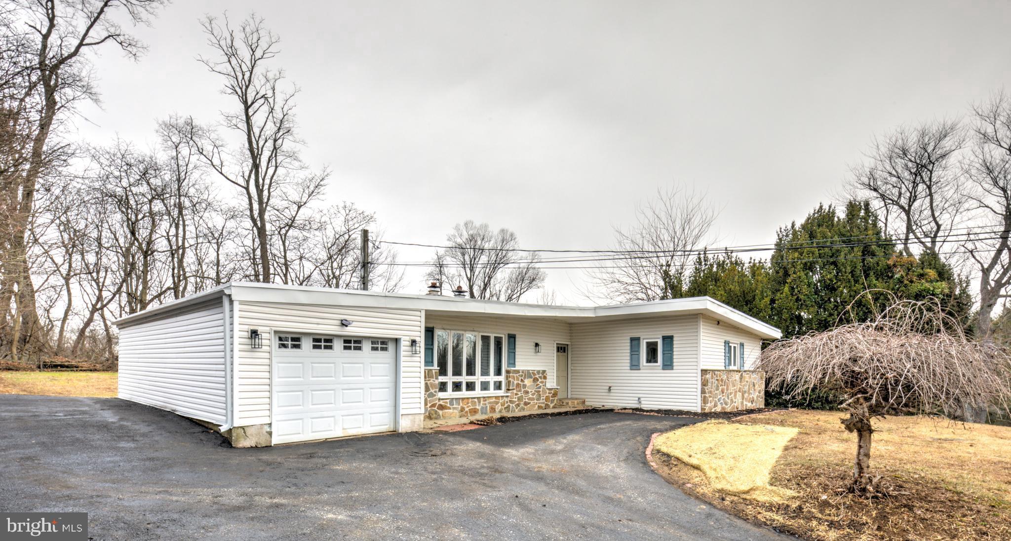 904 South Chester Road West Chester, PA 19382 - Photo 2 of 47 a view of house with a yard