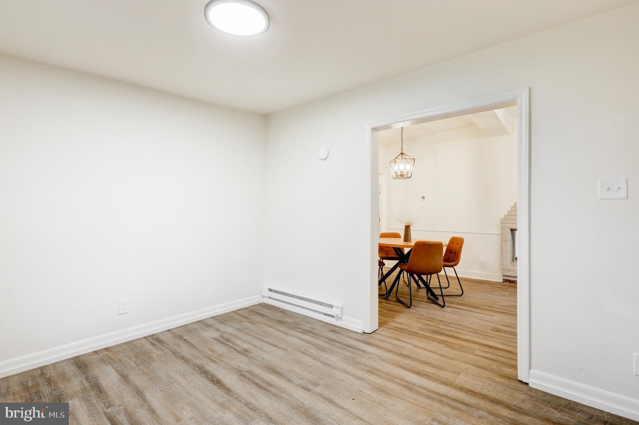 904 South Chester Road West Chester, PA 19382 - Photo 31 of 47 a view of a room with wooden floor and bench