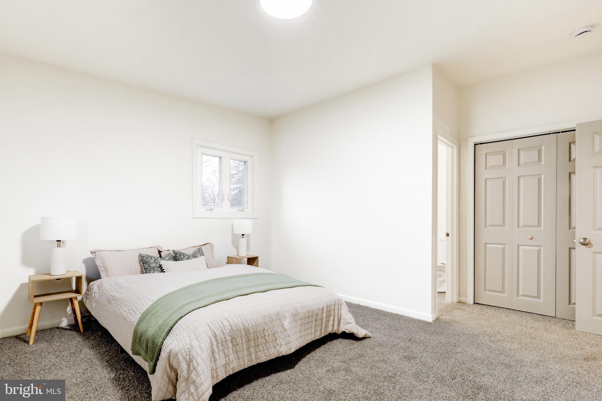 904 South Chester Road West Chester, PA 19382 - Photo 34 of 47 a bedroom with a bed and a window