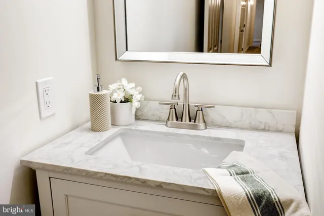 a view of an empty room with windows