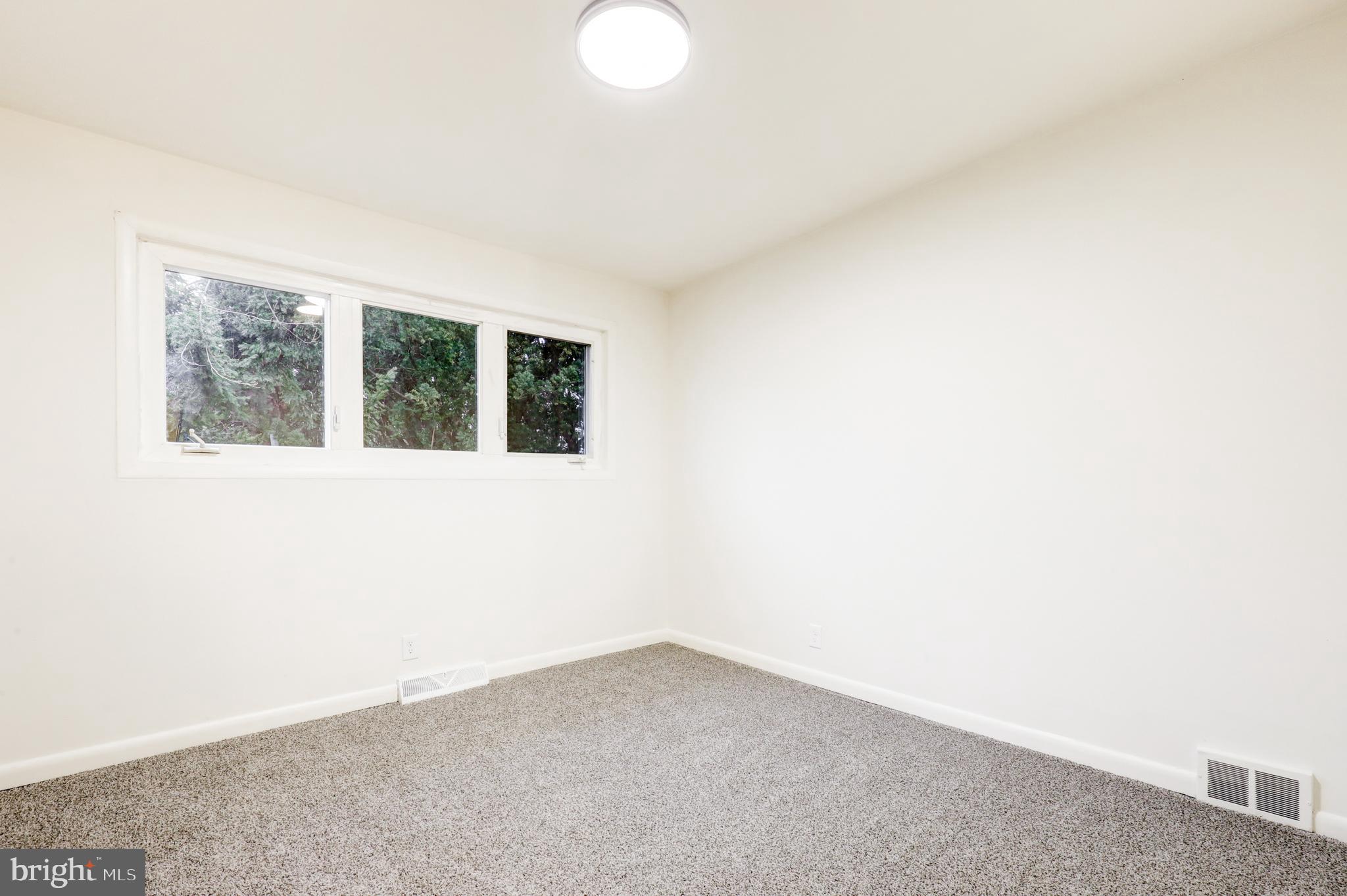 904 South Chester Road West Chester, PA 19382 - Photo 40 of 47 a view of an empty room with windows