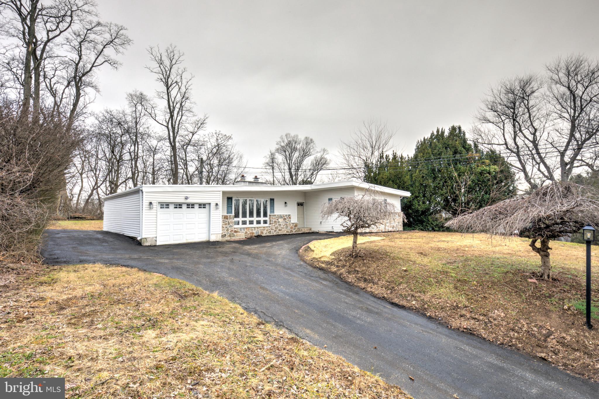 904 South Chester Road West Chester, PA 19382 - Photo 4 of 47 a view of a dry yard with trees