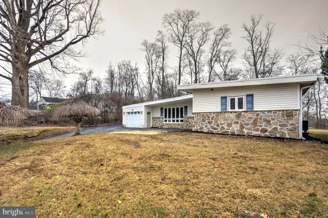 a house with yard in front of it