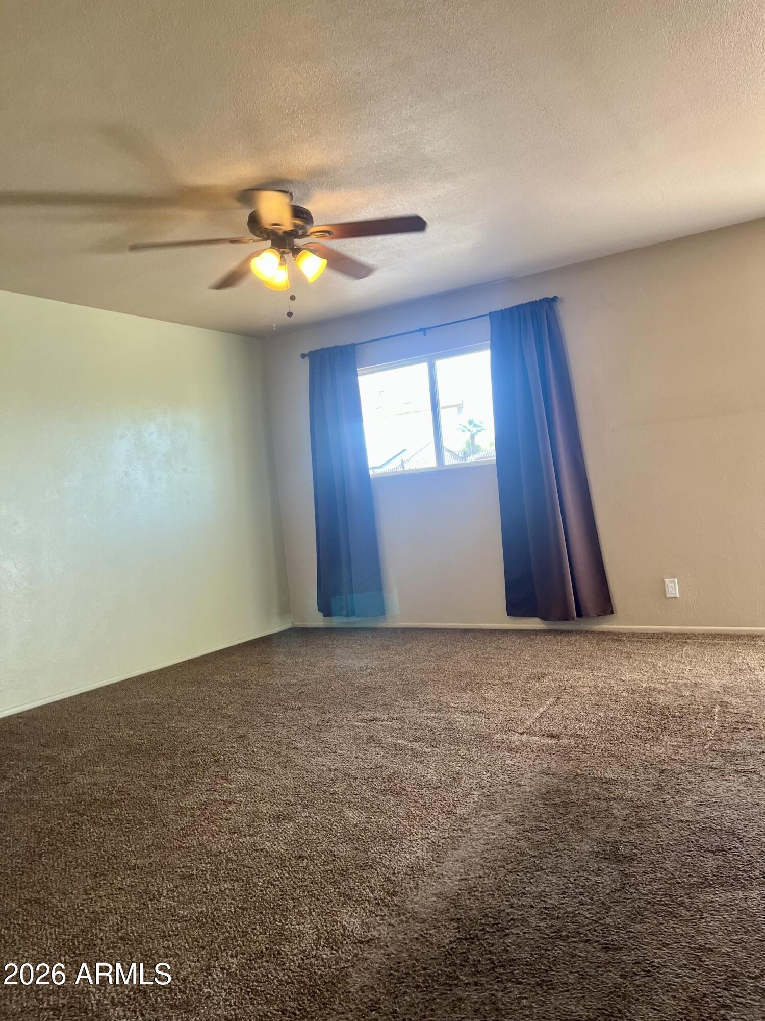 2315 West Butler Drive Phoenix, AZ 85021 - Photo 6 of 13 a view of an empty room