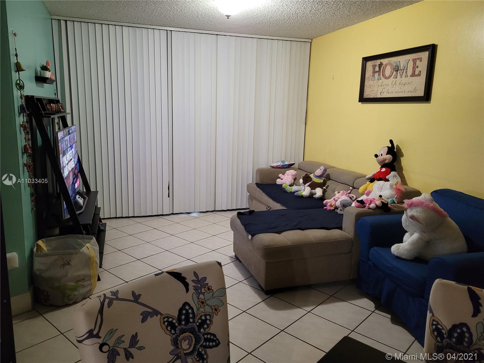 7075 Northwest 186th Street, Unit C110 Hialeah, FL 33015 - Photo 3 of 15