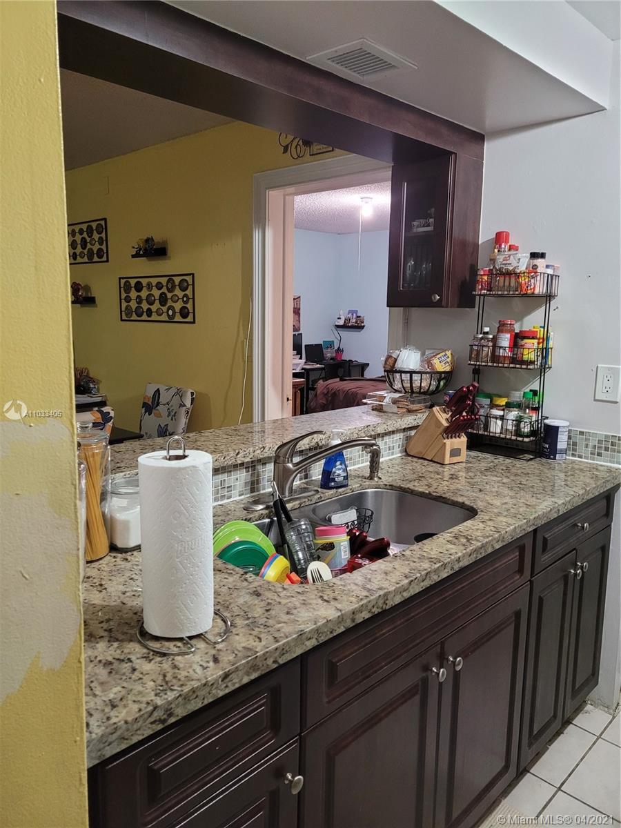 7075 Northwest 186th Street, Unit C110 Hialeah, FL 33015 - Photo 5 of 15