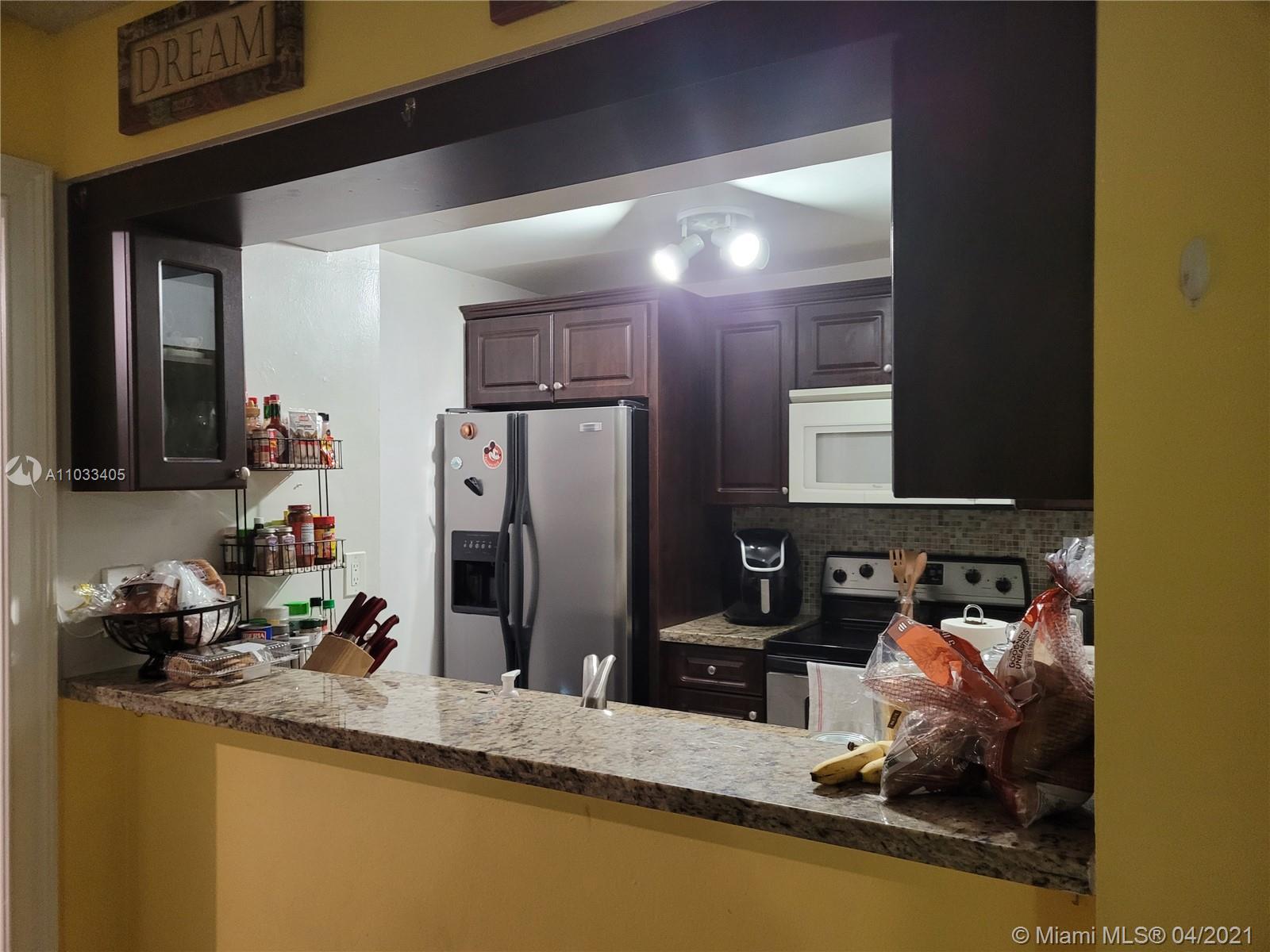 7075 Northwest 186th Street, Unit C110 Hialeah, FL 33015 - Photo 6 of 15