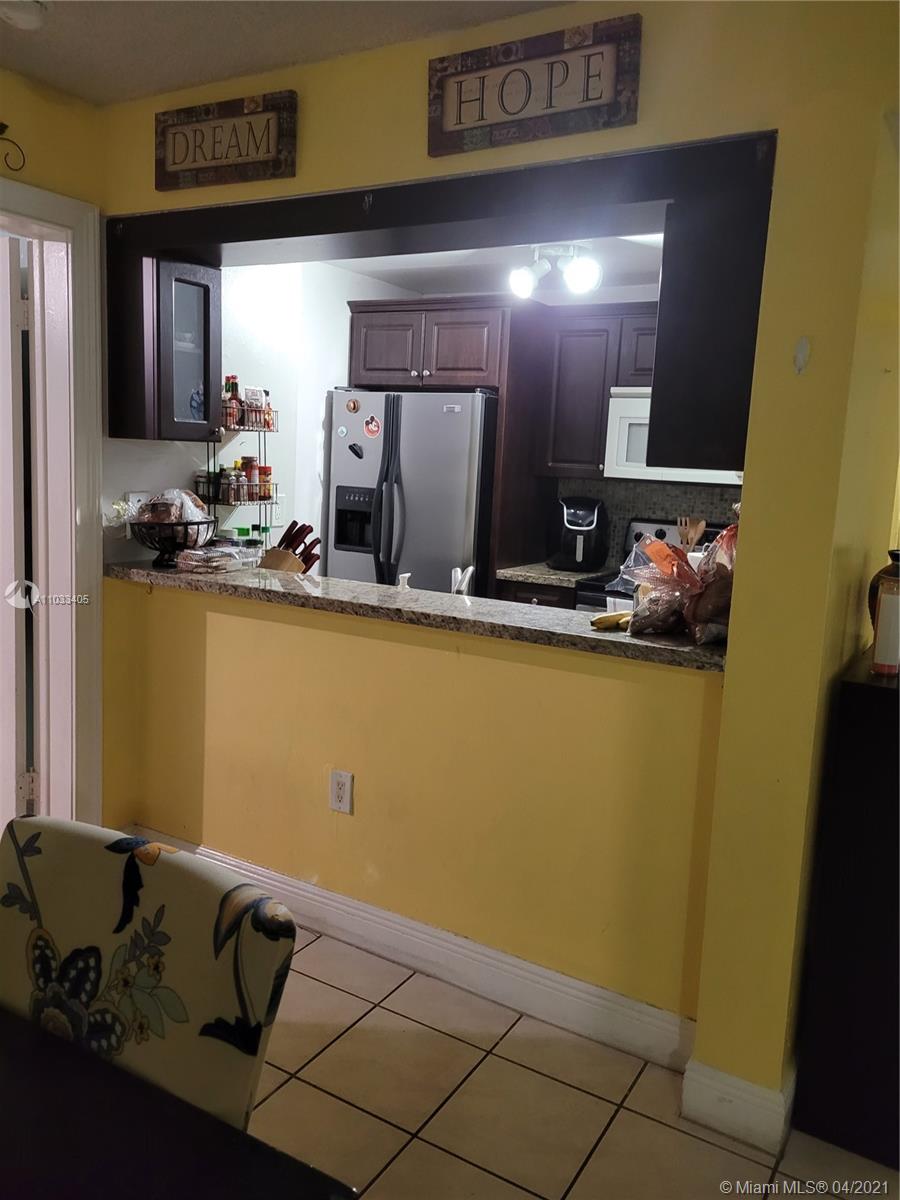 7075 Northwest 186th Street, Unit C110 Hialeah, FL 33015 - Photo 7 of 15