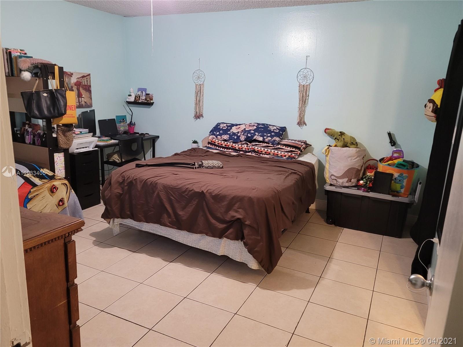 7075 Northwest 186th Street, Unit C110 Hialeah, FL 33015 - Photo 8 of 15
