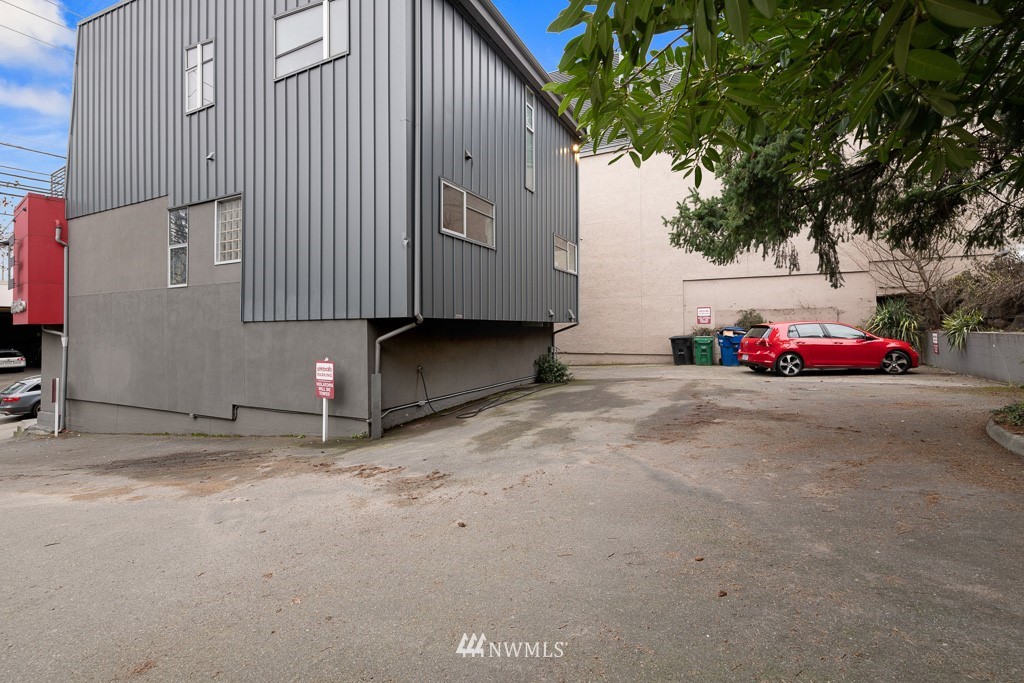 166 Roy Street Seattle, WA 98109 - Photo 4 of 5 a view of path and white house