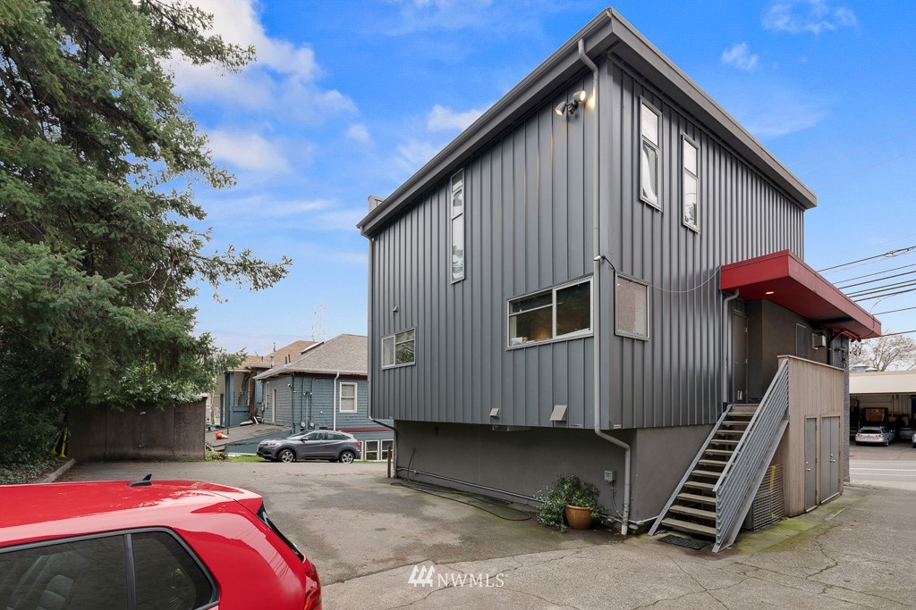 166 Roy Street Seattle, WA 98109 - Photo 5 of 5 a house view with a backyard space
