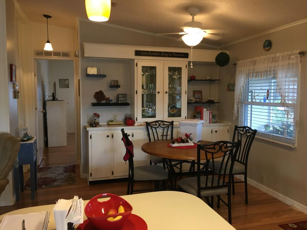108 Audubon Road Naples, FL 34114 - Photo 5 of 11 a dining room with furniture and window