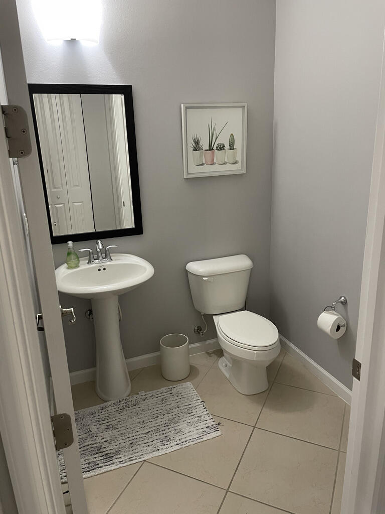 4940 Northwest 15th Avenue Boca Raton, FL 33431 - Photo 8 of 23 Powder Guest Bathroom
