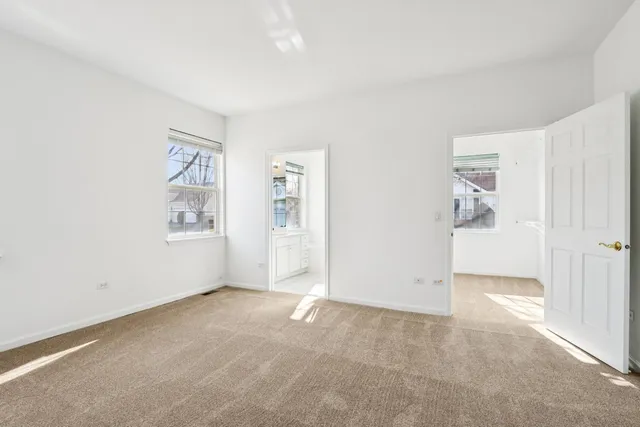 a bathroom with a shower sink and mirror